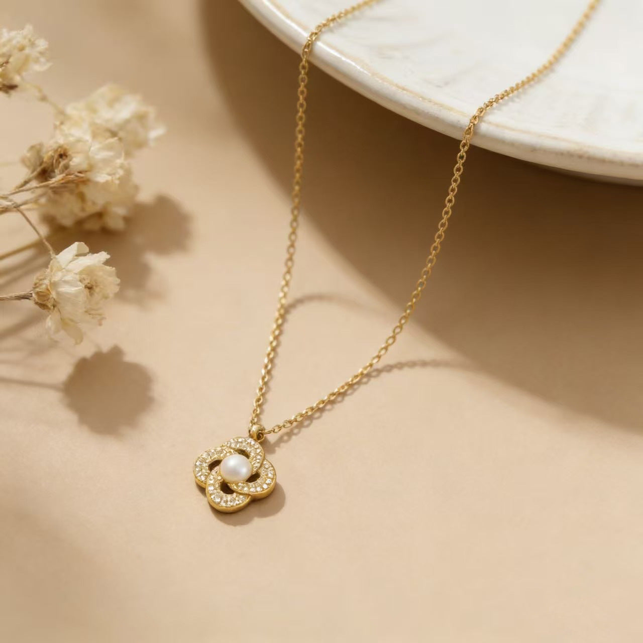 Zircon Pendant Encircling A Pearl Necklace